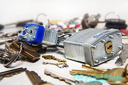 After trying every key in the junk drawer, Larry the Locksmith decided to open the lock the old fashion way - by picking it. - While you were sleeping...  Photography by Lon Casler Bixby - Copyright - All Rights Reserved - www.whileyouweresleeping.photography/